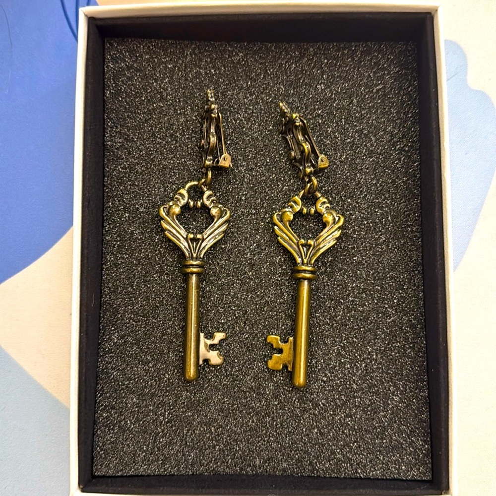 Moschino skeleton key clip on earrings
